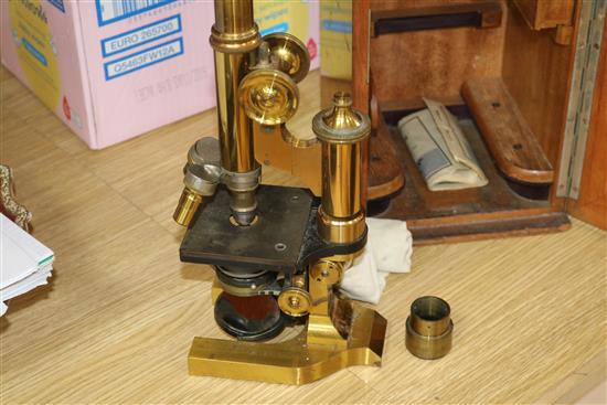 A Leitz Wetzlar brass microscope, in original case with accessories